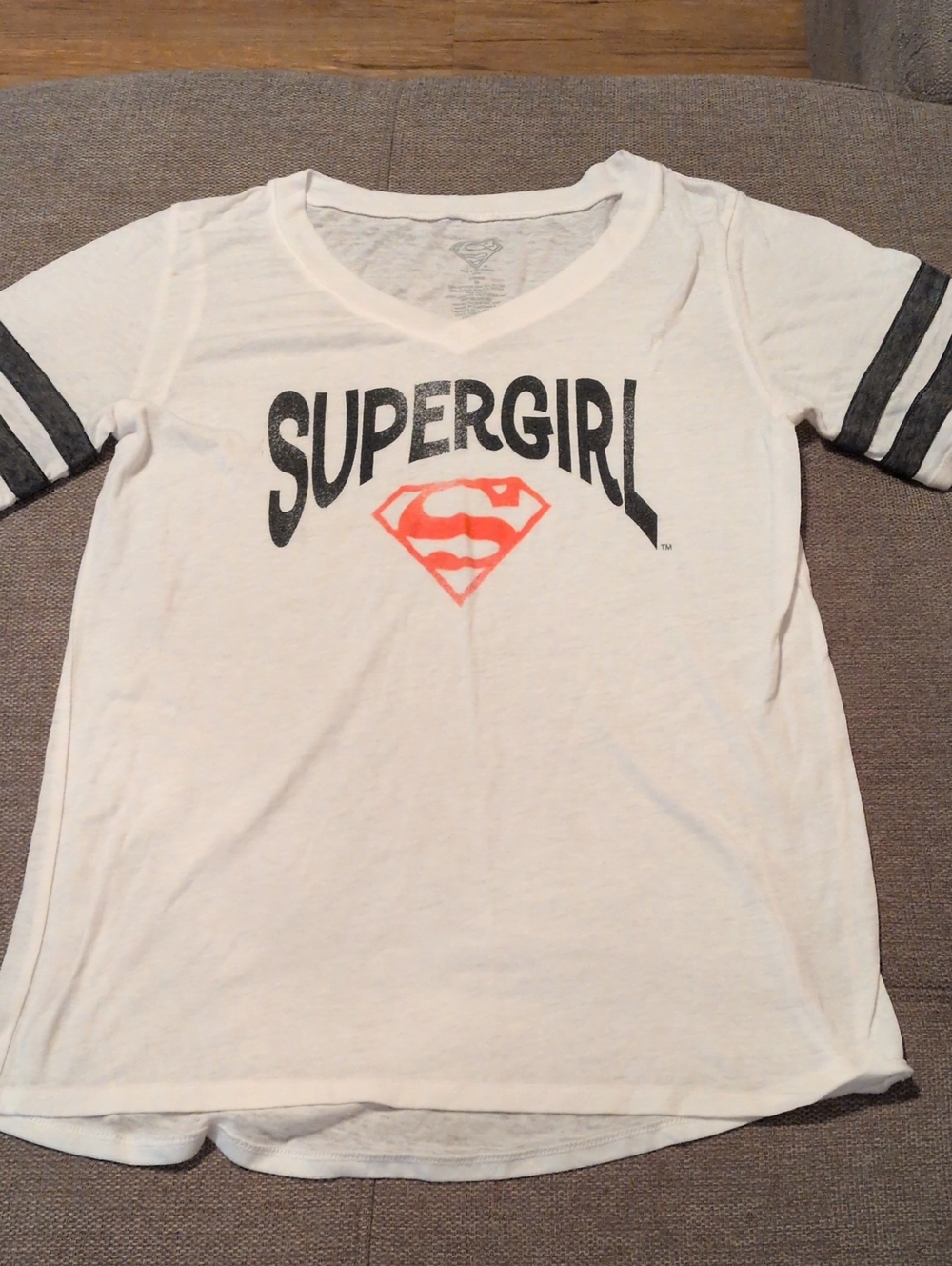 Supergirl Women's White V-Neck Tee with Logo